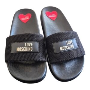 Love Moschino Black Slide Sandals with Red Heart Accent